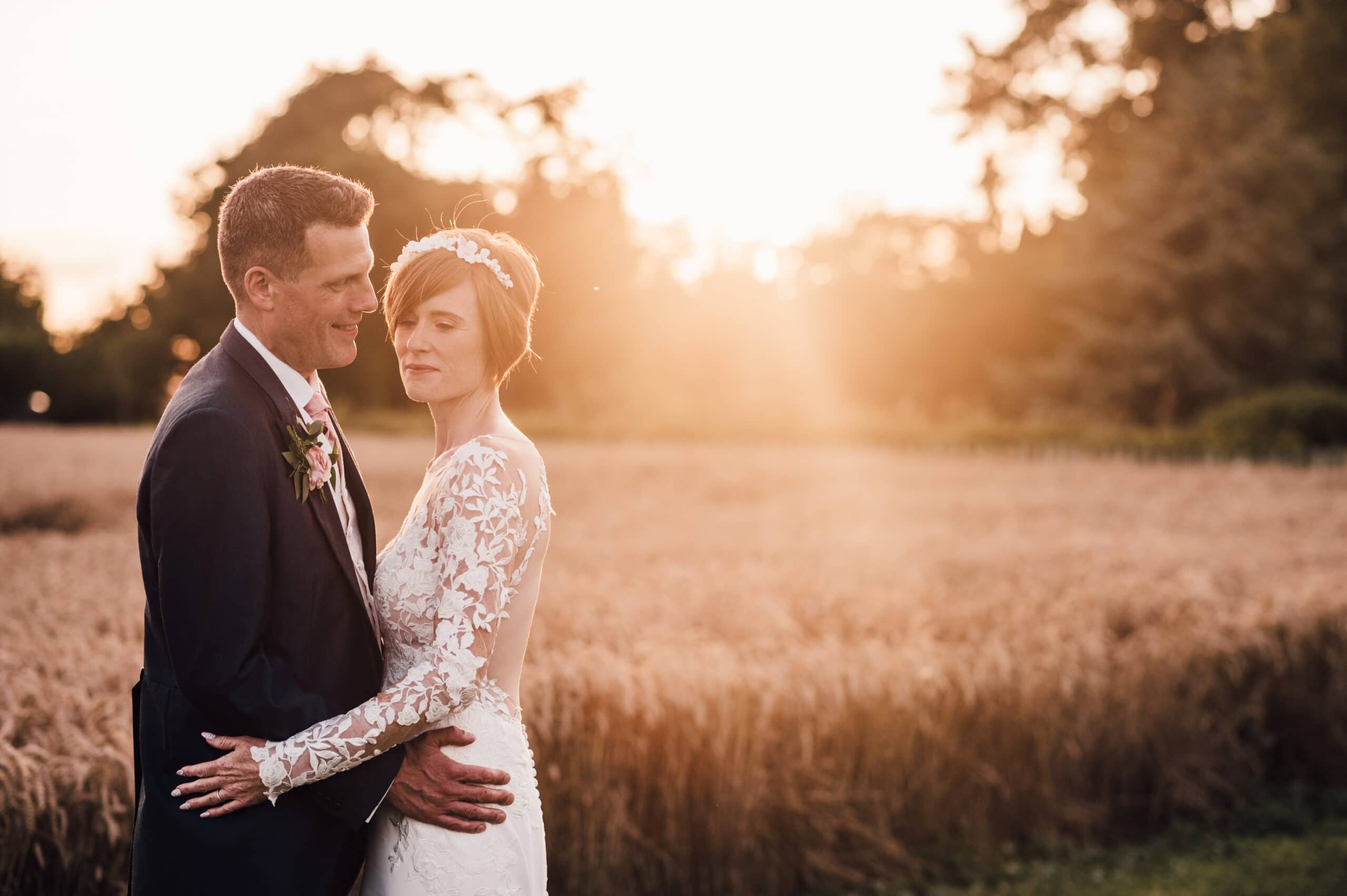Bride and Groom enjoying the grounds during golden hour at their Bassmead Manor Barns Wedding.