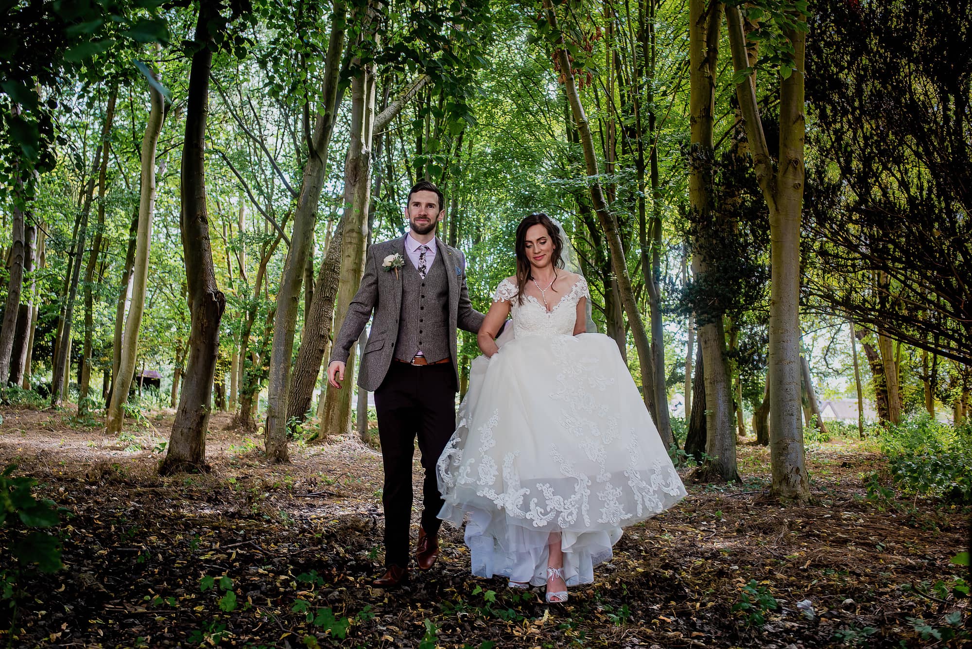 Couple portait in the woodland of Barrington Hall Wedding Venue in Cambridgeshire