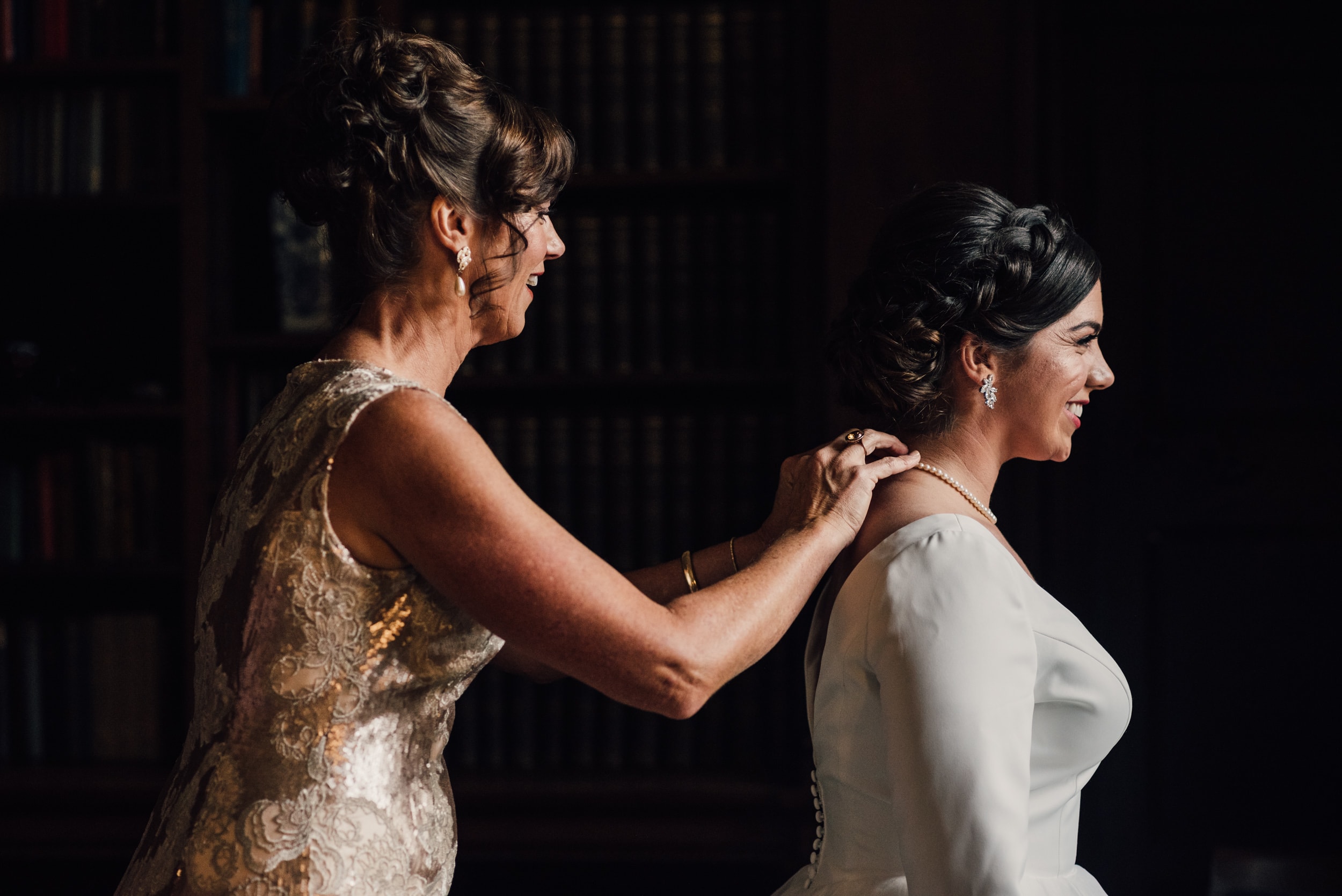 Bride and her mother during preparations for Westminster College Wedding in Cambridge