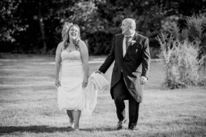 Cambridge Wedding Photographer Couple Walking Together at Lanwades Hall Wedding